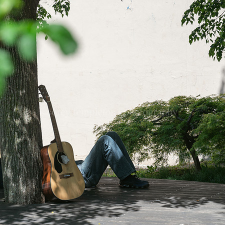 Guitar and legs Congress Square Park