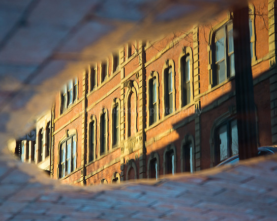 Reflection of the Portland Savings Bank Building on Exchange Str