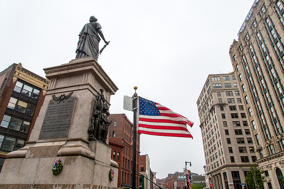 Memorial Day Flag at Our Lady of Victories Statue in Monument Sq