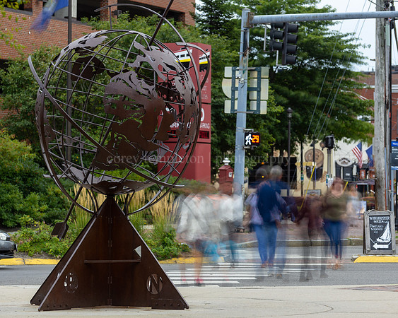 People Passing by Untitled-Armillary on Commercial Street