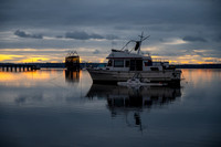 Boat at Rest East End Railroad Trestle Sunrise